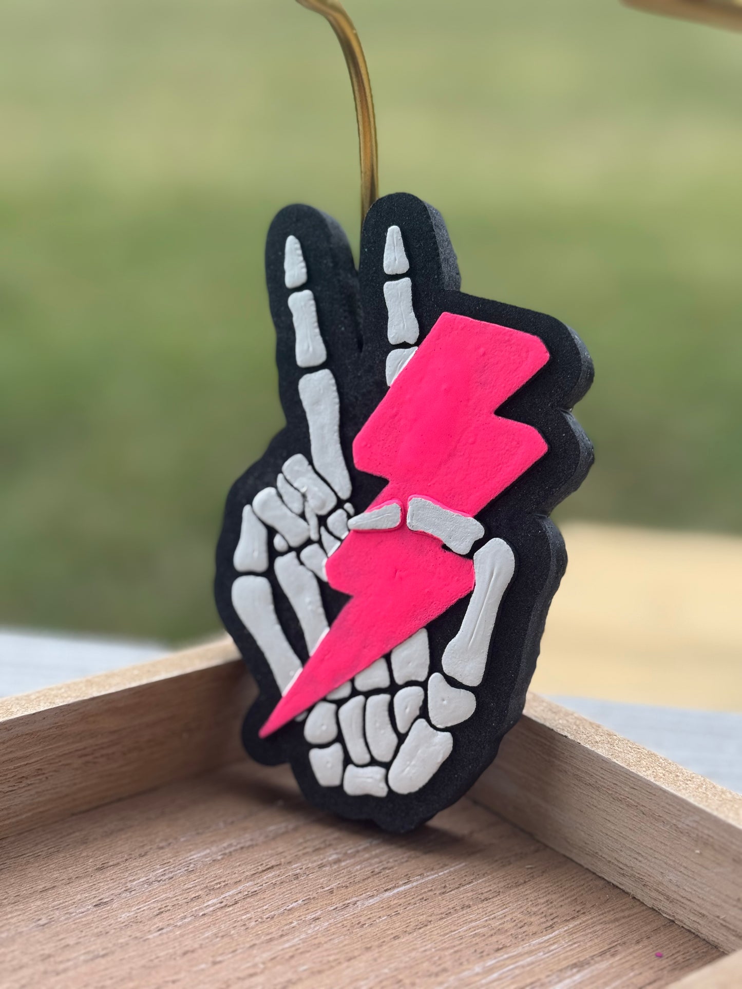 Neon Pink Skelly hand