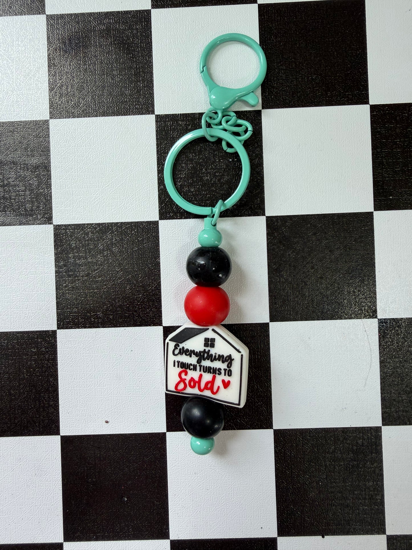 EVERYTHING I TOUCH TURNS TO SOLD KEYCHAIN