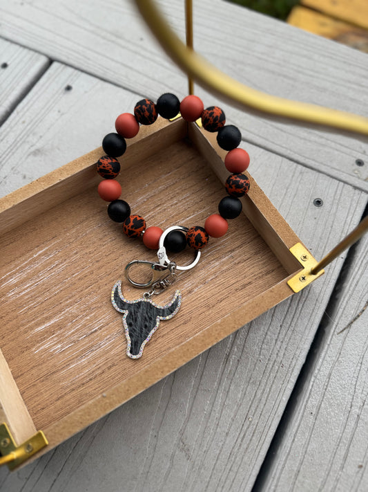 Cheetah w bull skull charm Wristlet