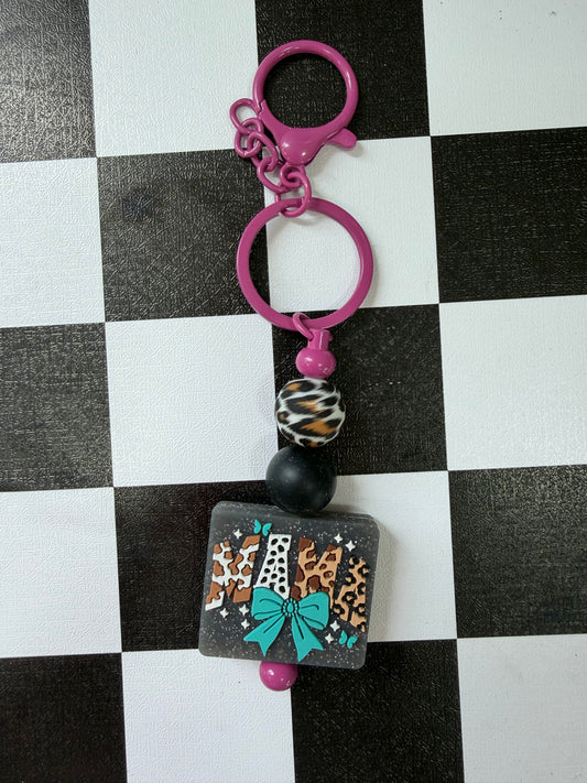 LEOPARD, COW MAMA KEYCHAIN